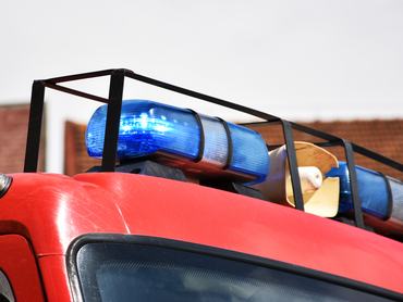 Lights and siren of a firefighter vehicle