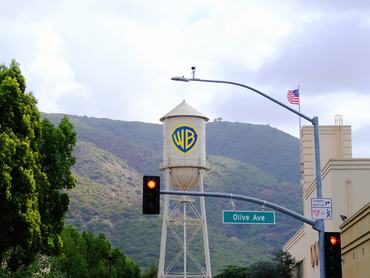 Burbank, California - October 13, 2025: The Warner Bros. Studios Water Tower with logo street view.